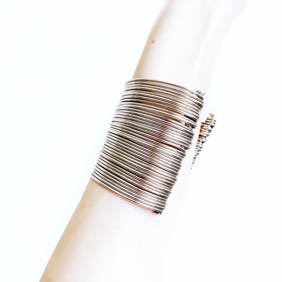 Two Silver Tone Wide Cuff Bangles - Picture 2 of 4